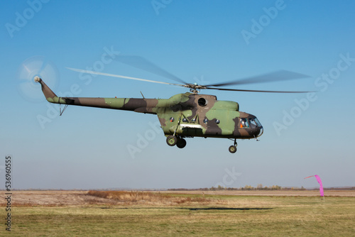 Fototapet Military helicopter mi 8 in the air