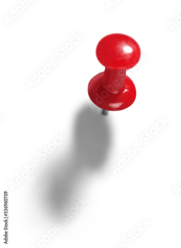 Red pushpin with shadow isolated on white background. photo
