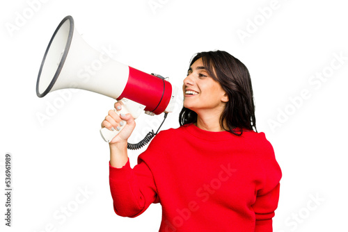 Young Indian woman holding a megaphone isolated