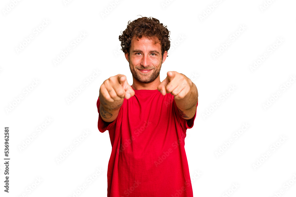 Young caucasian curly hair man isolated Young caucasian man with curly hair isolated cheerful smiles pointing to front.