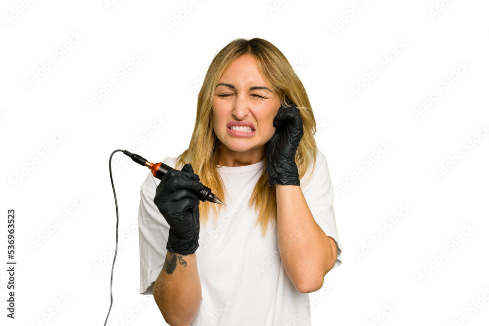 Tattoo artist caucasian woman isolated on green chroma background covering ears with hands.