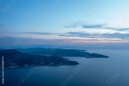 Sunset sky aerial photography with shoreline and ships on horizon top view © Aytug Bayer