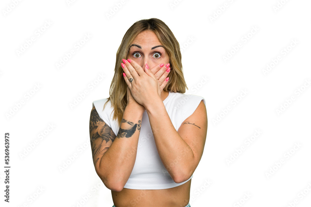 Young caucasian woman isolated on green chroma background shocked covering mouth with hands. Young caucasian woman isolated on green chroma background shocked covering mouth with hands.