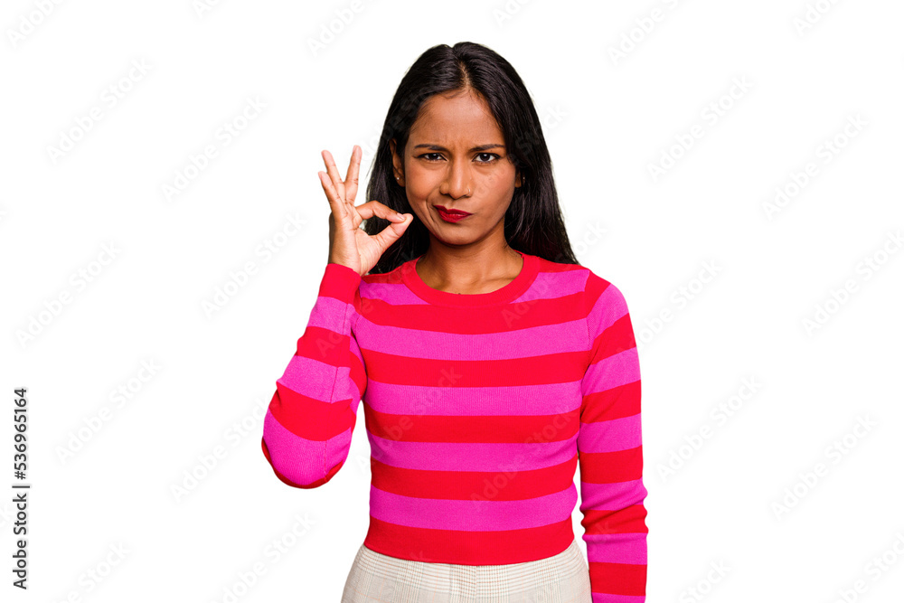 Young Indian woman isolated with fingers on lips keeping a secret. Young Indian woman isolated with fingers on lips keeping a secret.