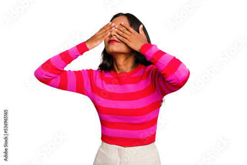 Young Indian woman isolated afraid covering eyes with hands.