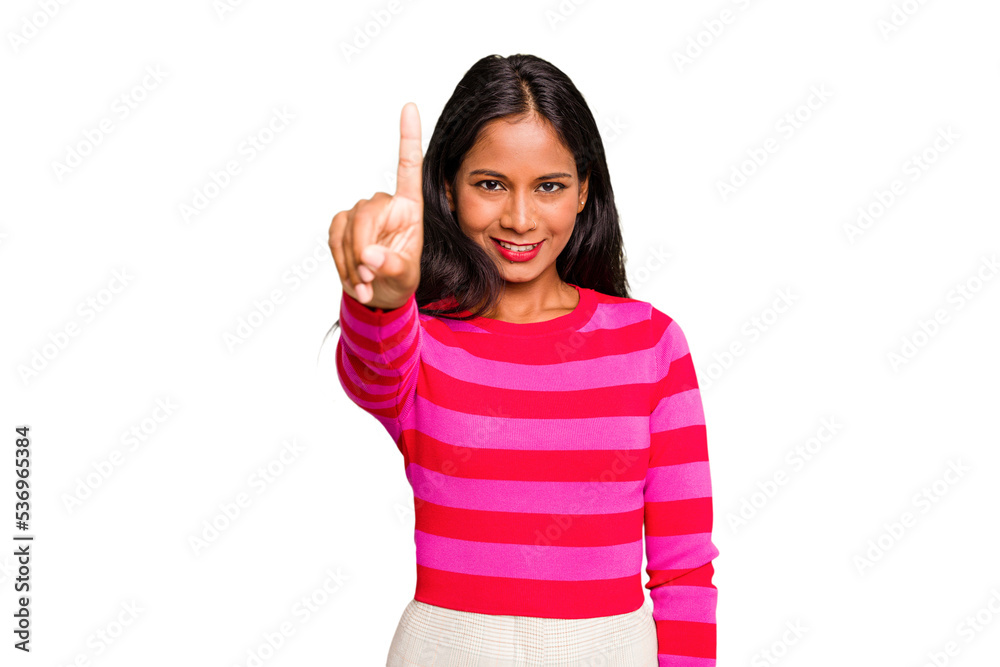 Young Indian woman isolated showing number one with finger. Young Indian woman isolated showing number one with finger.