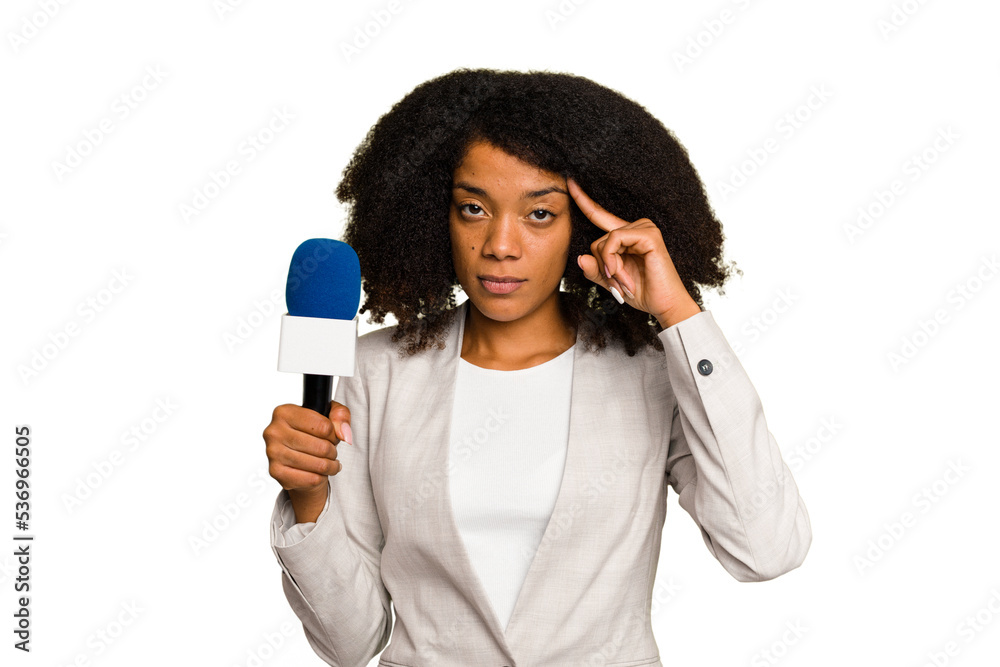 Young TV presenter African American woman with a microphone isolated pointing temple with finger, thinking, focused on a task. Young TV presenter African American woman with a microphone isolated pointing temple with finger, thinking, focused on a task.