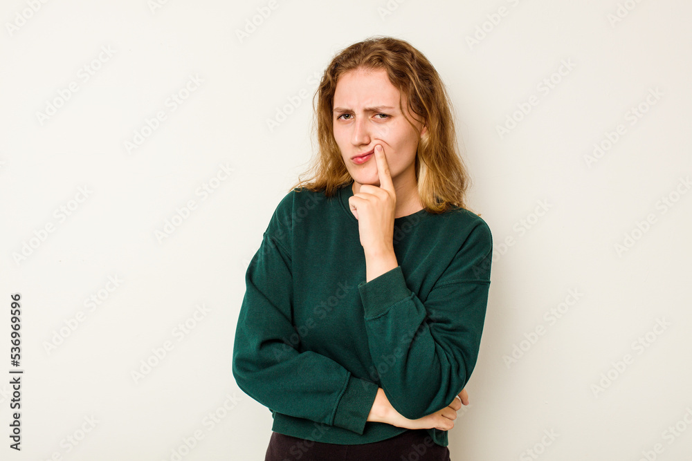 Young caucasian woman isolated on white background unhappy looking in camera with sarcastic expression. Young caucasian woman isolated on white background unhappy looking in camera with sarcastic expression.