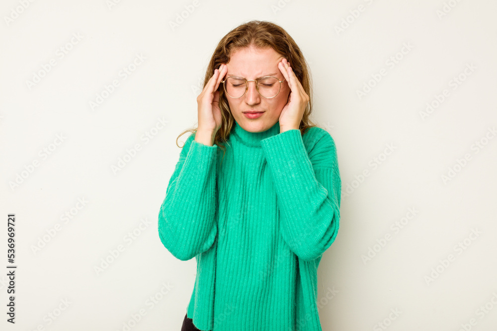 Young caucasian woman isolated on white background having a head ache, touching front of the face. Young caucasian woman isolated on white background having a head ache, touching front of the face.