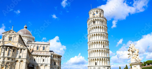 The bue sky view in Pisa Cathedral (Duomo di Pisa) with Leaning Tower  (Torre di Pisa) Tuscany, Italy.The Leaning Tower of Pisa is one of the main landmark in Italy. photo