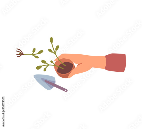 Houseplant care and gardening hobby, isolated hand holding small pot with flower with foliage. Instrument for cultivation, spade. Vector in flat cartoon style