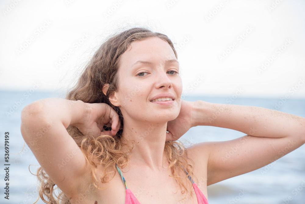 Portrait beautiful woman with bikini on the beach. Holiday and summer travel concept. Portrait beautiful woman with bikini on the beach. Holiday and summer travel concept.