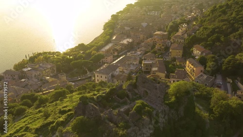 Cinematic Aerial View Above Orsinis Fortress in Trevignano Romano, Lazio, Italy photo