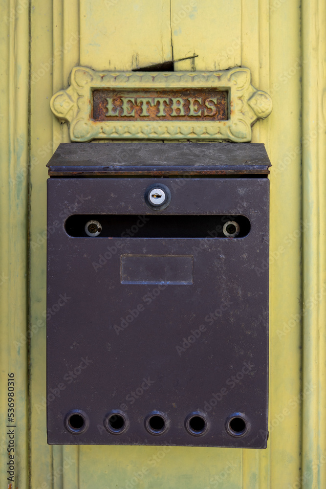 Gray metal mailbox with the lettering Gray metal mailbox with the lettering