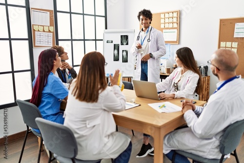 Group of young doctor discussing in a medical meeting at the clinic office.