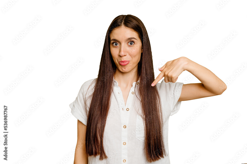 Young caucasian long hair woman isolated person pointing by hand to a shirt copy space, proud and confident Young caucasian long hair woman isolated person pointing by hand to a shirt copy space, proud and confident