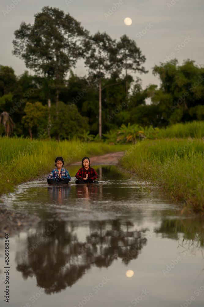 Children playing on flooding in rural Children playing on flooding in rural