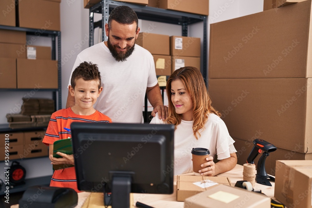 Family smiling confident working at storehouse Family smiling confident working at storehouse