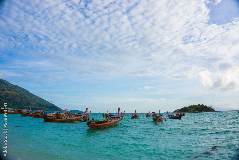 Wooden fishery boat on sea beach wave sunset cloud sky