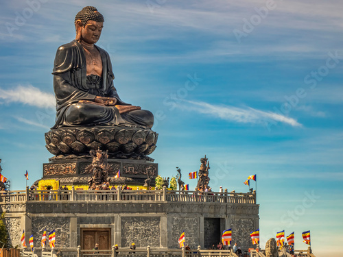Buddha statue on top of Fansipan in Sun word Fansipan Legend, Sapa, Lao Cai, Vietnam. photo