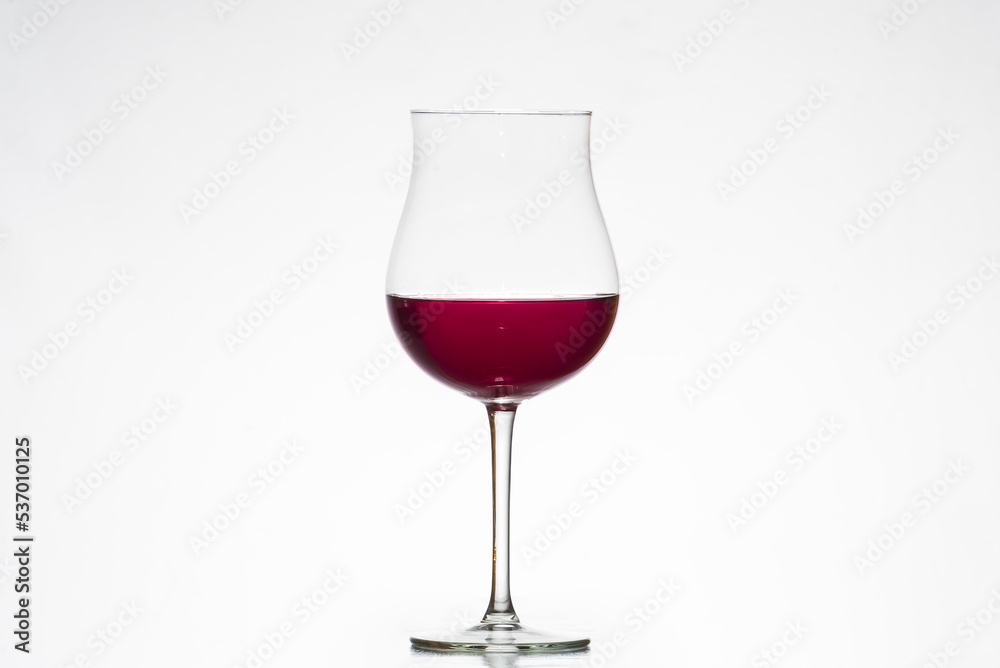 glass with red wine, tulip glass, winemaking, wineries, white background. glass with red wine, tulip glass, winemaking, wineries, white background.