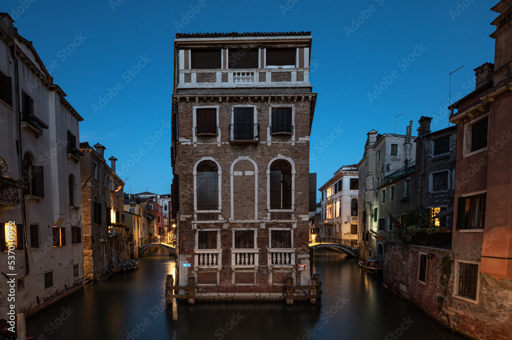 View of Tetta Palace in Venice at dusk with blue hour and lights in long exposure photography.
