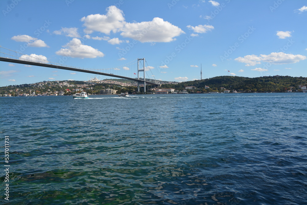 Istanbul city, mosque, bridge, water view, sky and clouds