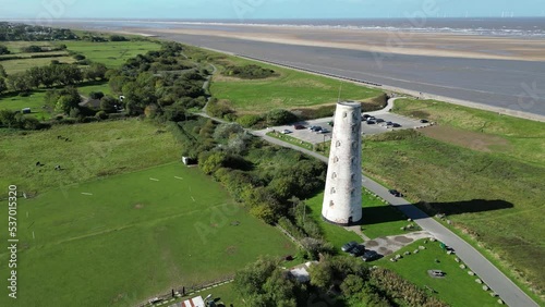 Leasowe Lighthouse aerial drone pan coastline reveal on a sunny afternoon photo