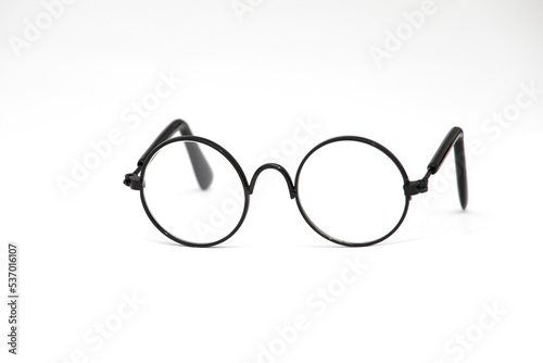 Glasses with round glasses in a standard black frame isolated on a white background. Reading Glasses