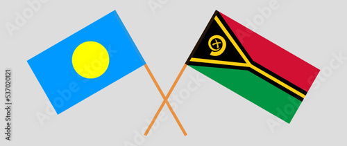 Crossed flags of Palau and Vanuatu. Official colors. Correct proportion