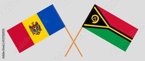 Crossed flags of Moldova and Vanuatu. Official colors. Correct proportion