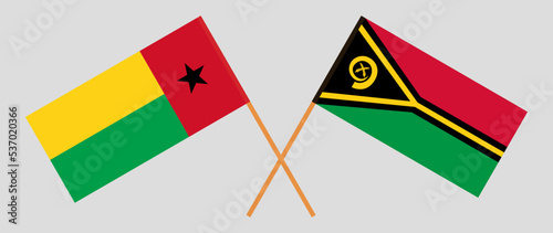 Crossed flags of Guinea-Bissau and Vanuatu. Official colors. Correct proportion