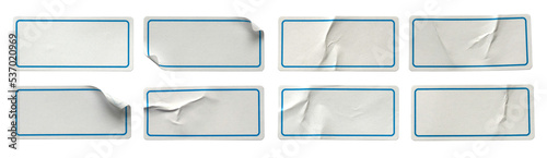 A set of white rectangular paper sticker label isolated on white background.