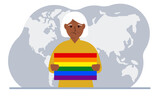 A old woman holds an lgbt flag in his hands against the backdrop of a world map.