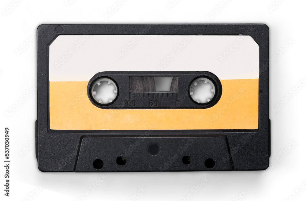 Old audio cassette isolated on white background