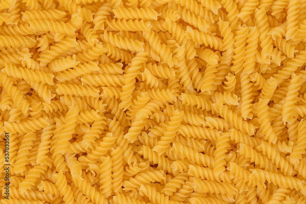 Spiral pasta background texture closeup Spiral pasta background texture closeup