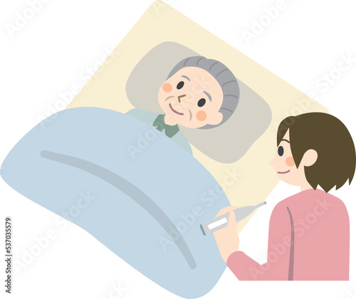 高齢者の熱を測る看護師