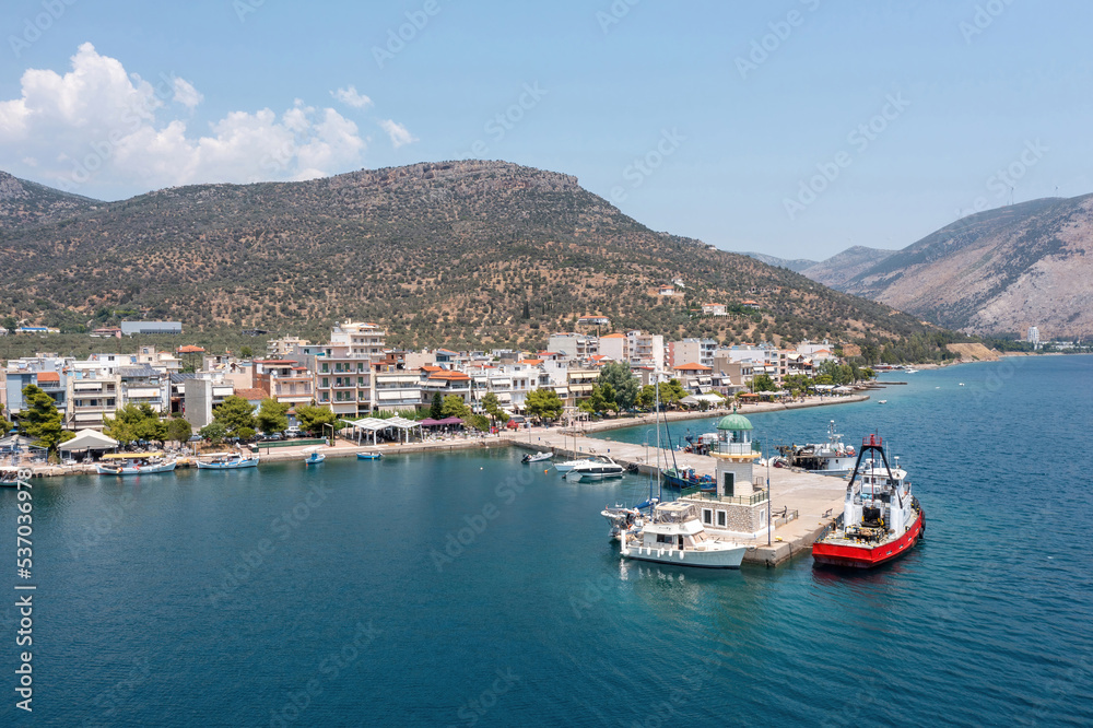 Antikyra Greece, aerial drone view. Coastal village and boats in Boeotia