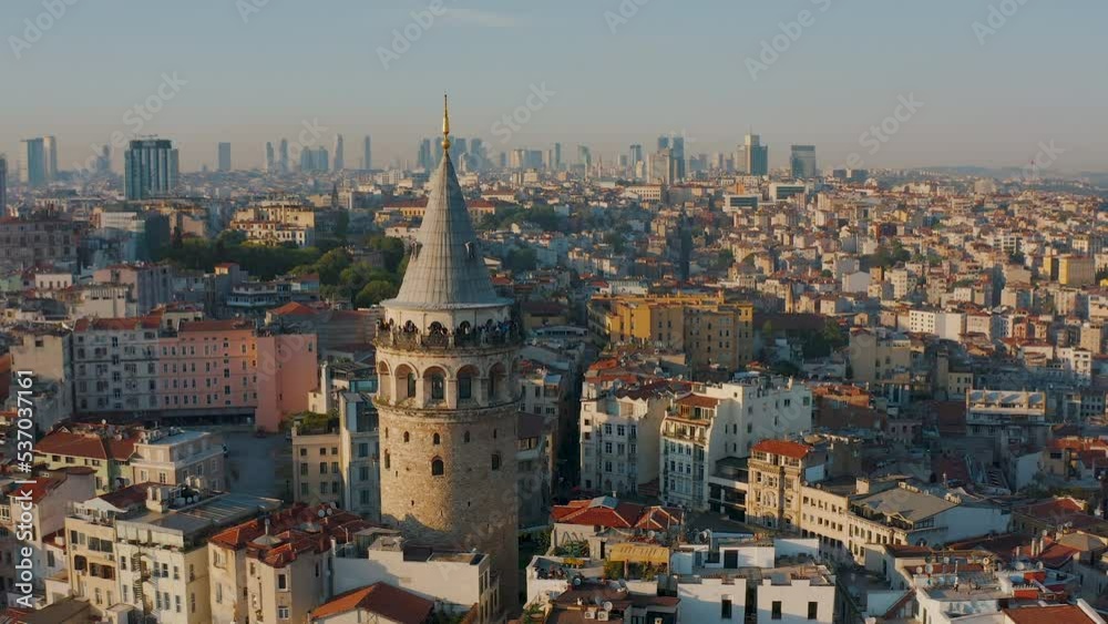 Galata tower in Istanbul, Turkey at sunset, sunny day, golden hour. Aerial drone shot from above, European part of city, downtown, most popular landmark, beautiful landscape, tourism Galata tower in Istanbul, Turkey at sunset, sunny day, golden hour. Aerial drone shot from above, European part of city, downtown, most popular landmark, beautiful landscape, tourism