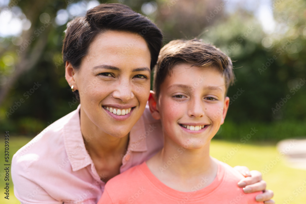 Caucasian mother and son spending time together in the garden Caucasian mother and son spending time together in the garden