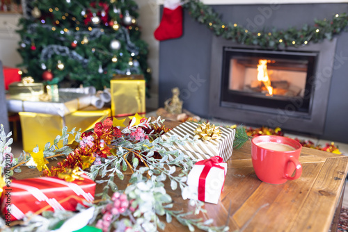 A modern living room decorated with christmas decorations  a christmas tree and gifts