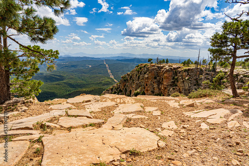 Looking ovr the edge of the Mogollon Rim at the forest and Mountains in Arizona photo