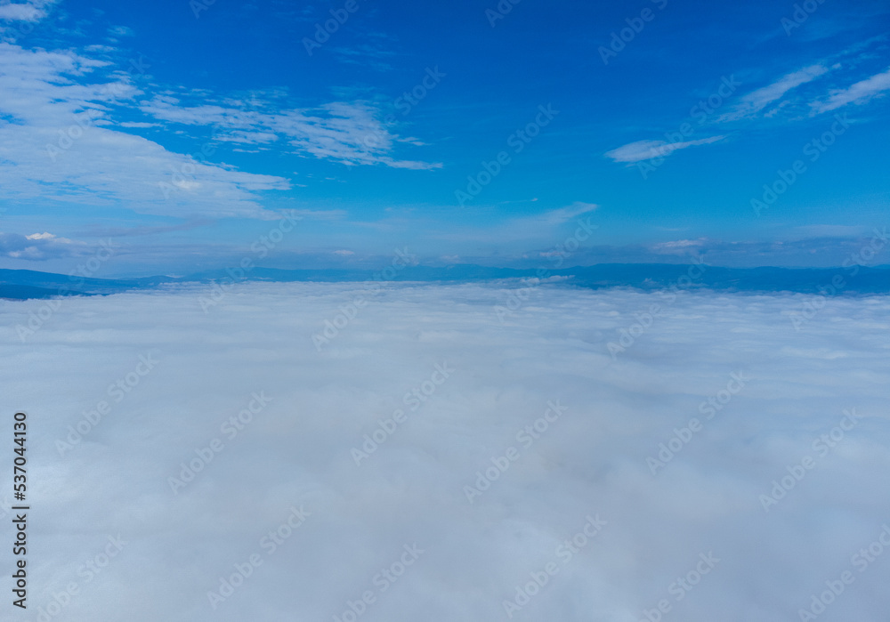 Landscape above a layer of fog Landscape above a layer of fog