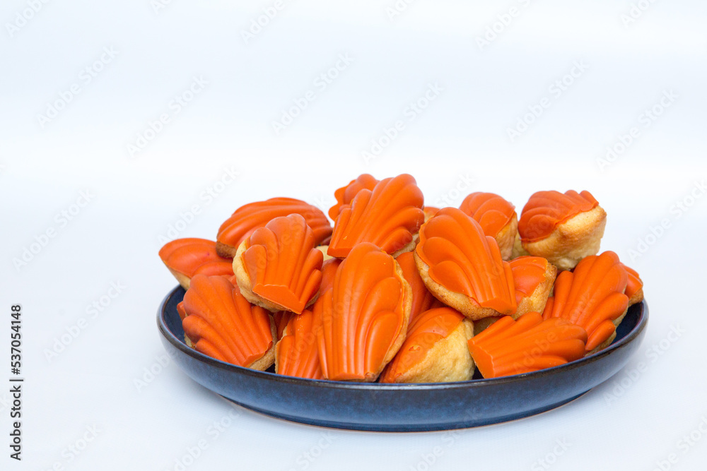 Shortbread cookies covered with sweet icing on a plate Shortbread cookies covered with sweet icing on a plate