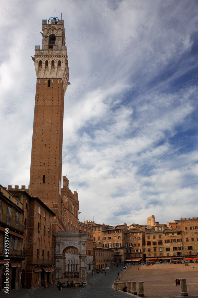 The Torre del Mangia and Palazzo Pubblico, from the corner of the Piazza del Campo, Siena, Tuscany, Italy