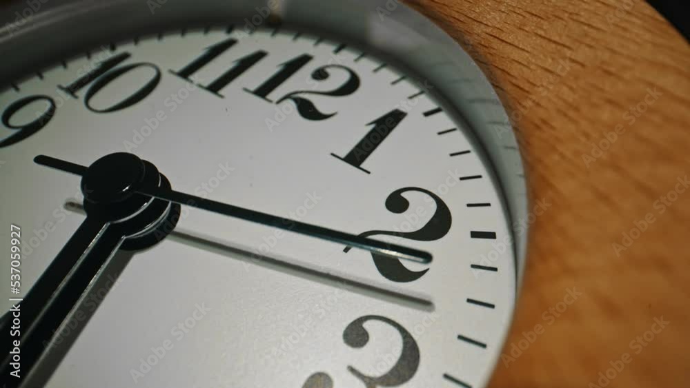 Wooden round clock. Close-up view. Wooden round clock. Close-up view.