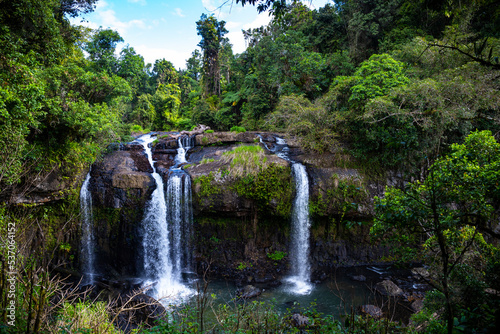 tropical rainforest waterfall in the atherton tablelands in queensland, australia; hidden gems of australia; hiking in the australian rainforest