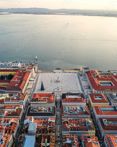 Aerial view of Lisbon main square (Praca do Comercio) along the Tagus river at sunset, Lisbon, Portugal. photo
