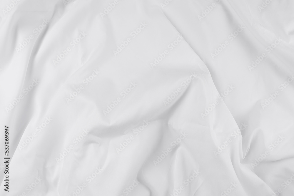 Obraz premium White fabric. luxurious white fabric texture background. Creases of satin, silk, and cotton.