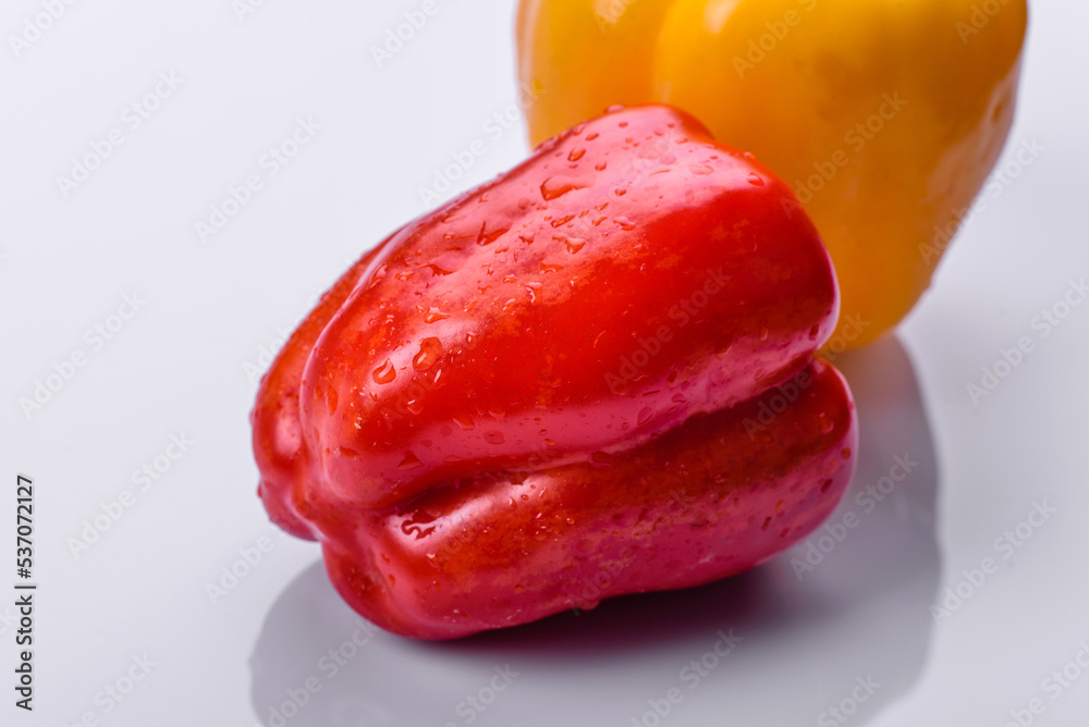 Fresh torn red sweet pepper from the autumn harvest
